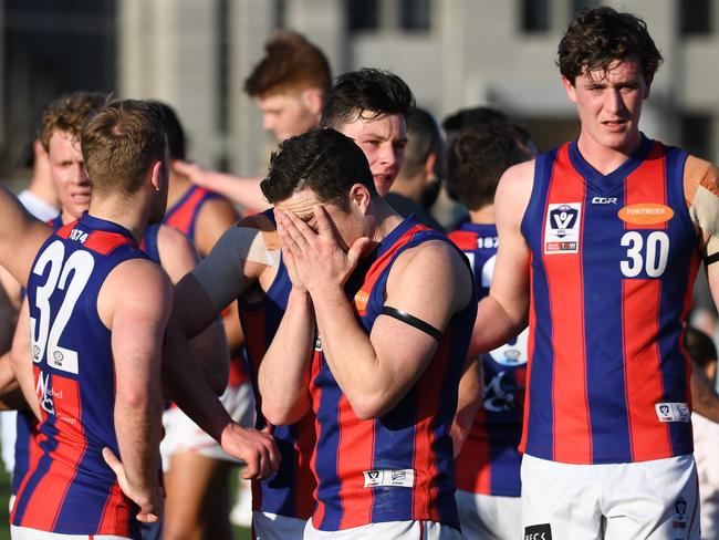 Disappointed Port players after the siren.