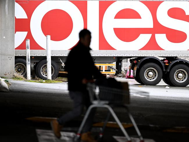 BRISBANE, AUSTRALIA - NewsWire Photos - JULY 20, 2022. A shopper outside a supermarket in Brisbane. New research has revealed Australian shoppers are paying almost seven per cent more at Coles and Woolworths for some of their favourite foods and products. Picture: NCA NewsWire / Dan Peled