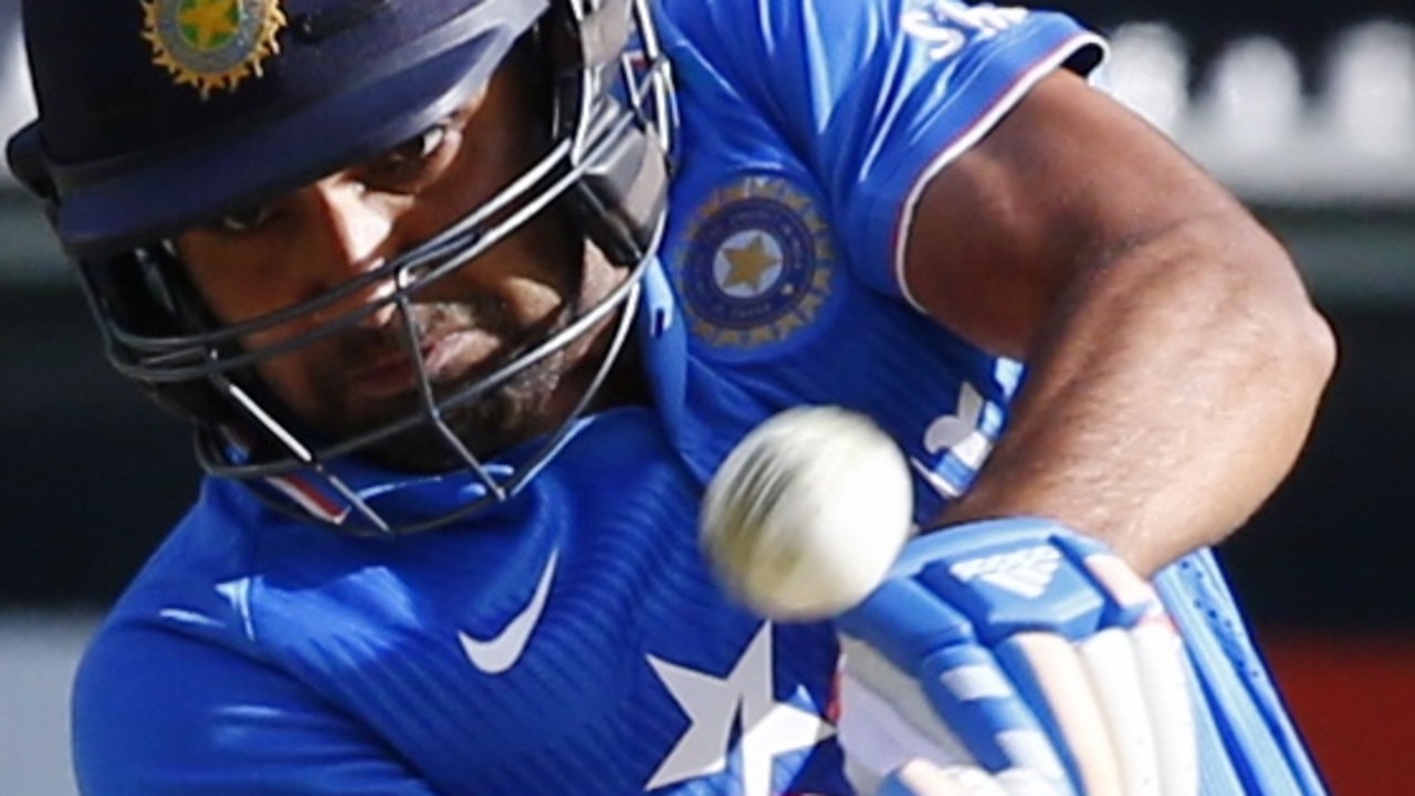 Australia v India Picture:Wayne Ludbey Rohit Sharma hits a six to bring up his 100 runs off James Faulkner