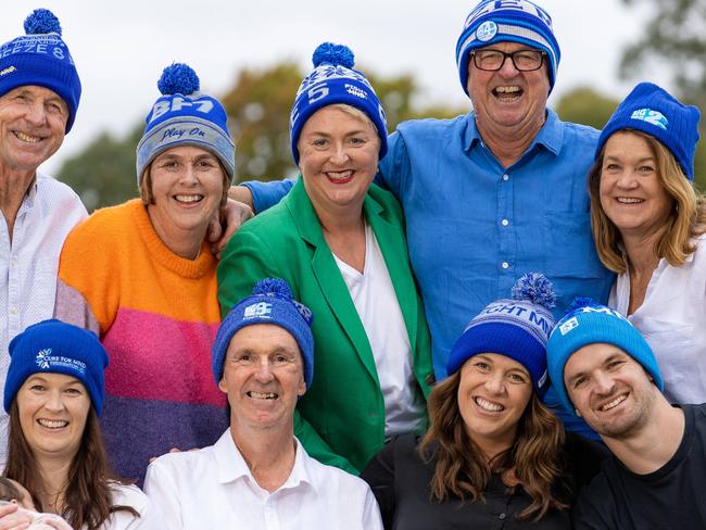 A family effort. The Danihers in 2023: Back row – Terry, Colleen Bruest (sister), Neroli Daniher (sister), Anthony, Jan Front – Lauren Daniher (daughter) holding Grace, Neale, Bec, Ben (son). Picture: Jason Edwards