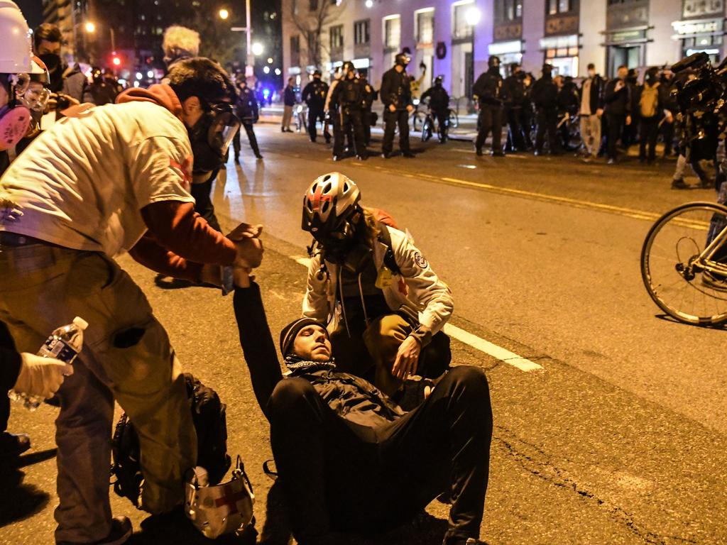 A counter protester is attended to by medics. Picture: Stephanie Keith/Getty Images/AFP