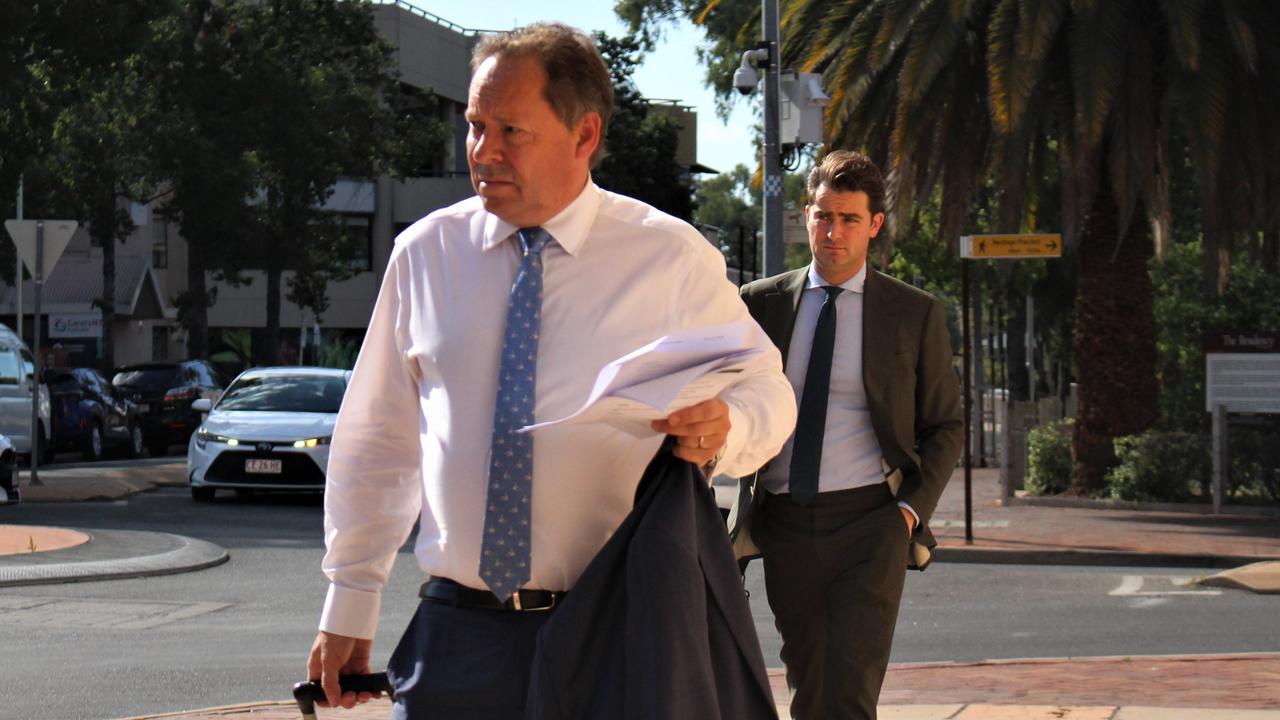 Zach Rolfe's lawyers David Edwardson KC and Frank Merenda outside the Alice Springs Local Court. Picture: Jason Walls