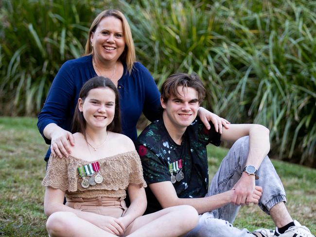 COPYRIGHT WARNING for Moreton Life ONLY. Phone Kylie Knight 3480 8226. Legacy widow Rebecca Beckwith and her children William and Ella. Picture: Hannah Photography