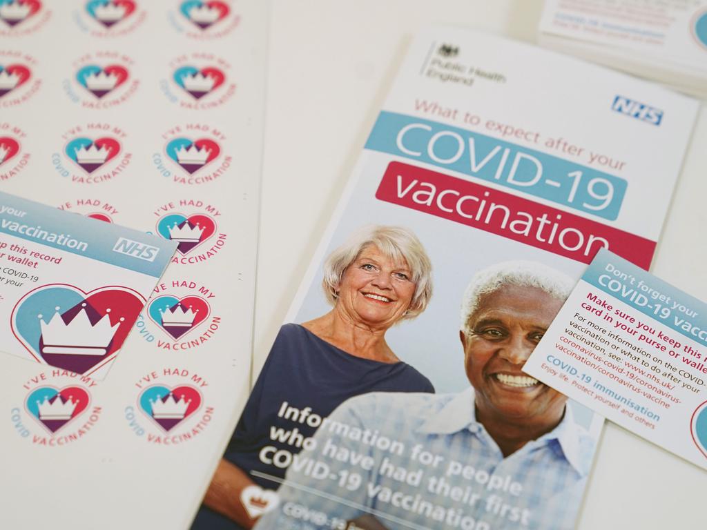 The jab must be given in two doses three weeks apart. Pictured, reminder cards for the UK to ensure people come back for their second dose. Picture: Owen Humphreys – Pool / Getty Images)