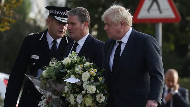 Keir Starmer, leader of the Labour Party, and Boris Johnson, Prime Minister lay flowers at Belfairs Methodist Church on October 16, 2021 in Leigh-on-Sea, United Kingdom. Picture: Getty