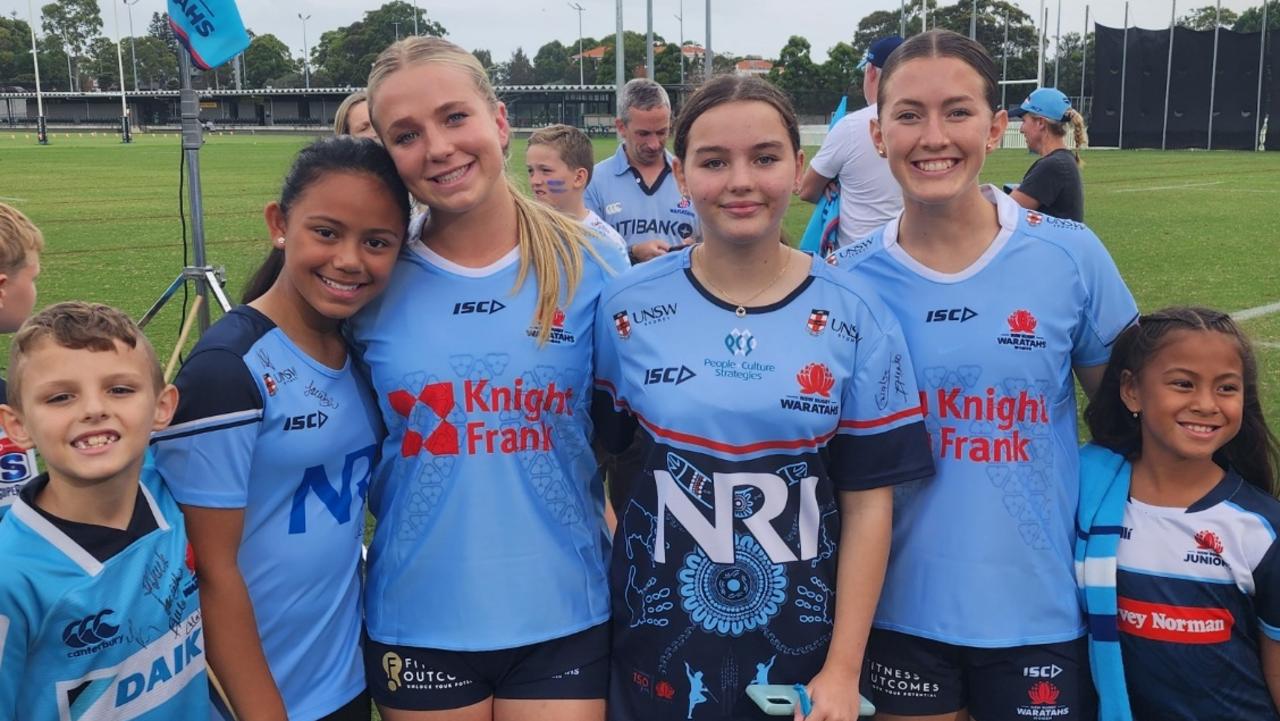 Waratahs players with young rugby fans. Picture: Supplied