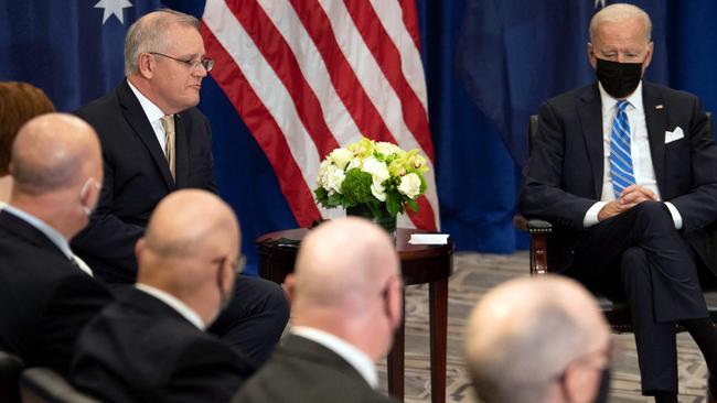 Prime Minister Scott Morrison - here with President Joe Biden - has been busy in the US this week. Picture: AFP