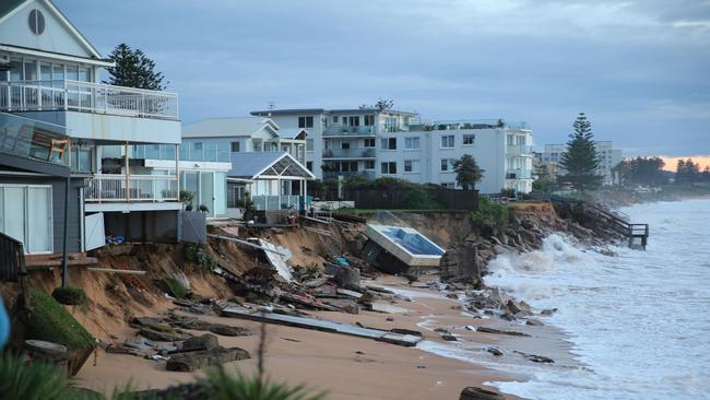 How the devastated Collaroy beach front looks today, after the sea took chunks of land, property and possessions during the storm. Picture: John Grainger