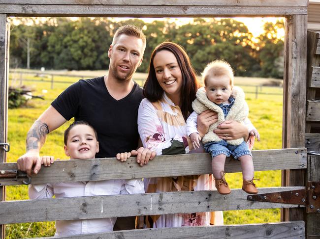 Mitch and Nicole Morris with their sons Jax (left) and Brock have sold their Dubbo investment property to help fund a move from Sydney to Coffs Harbour. Picture: Heidi Bell/Heidi Bell Photography.