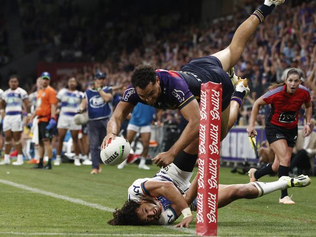 MELBOURNE, AUSTRALIA - MARCH 16: Xavier Coates of the Storm scores the match winning try during the round two NRL match between Melbourne Storm and New Zealand Warriors at AAMI Park, on March 16, 2024, in Melbourne, Australia. (Photo by Daniel Pockett/Getty Images)