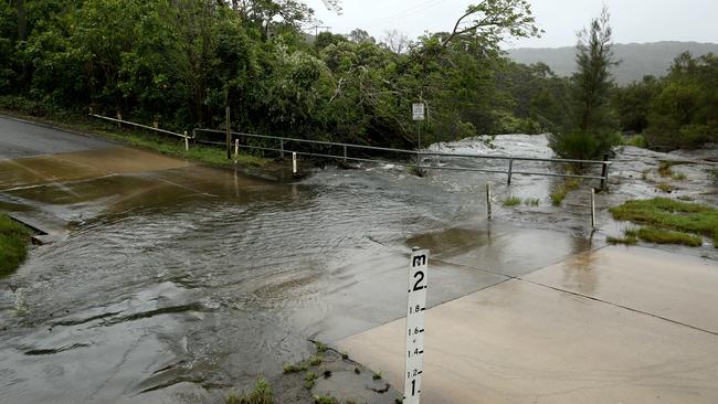 Oxford Falls Road in Oxford Falls was closed to Wakehurst Parkway yesterday due to heavy rain. Picture: NCA NewsWire / Damian Shaw