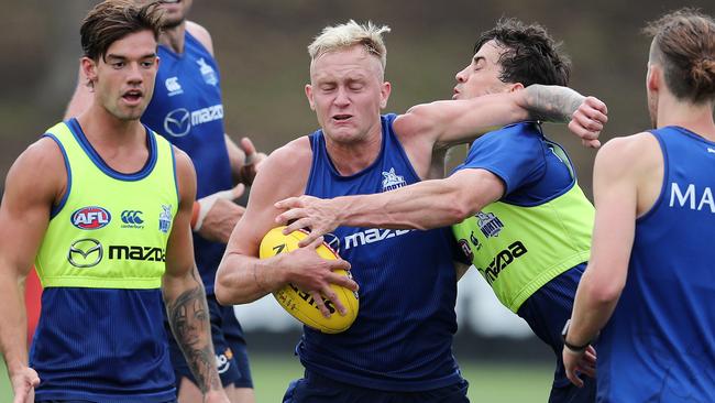 Jaidyn Stephenson tries to break clear during training. Picture: Michael Klein