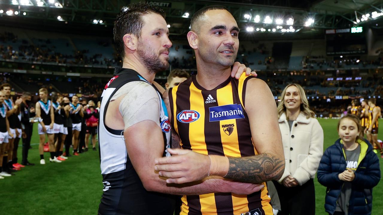 Boak congratulates Shaun Burgoyne after his 400th game. The pair shared plenty of game time together at Port.