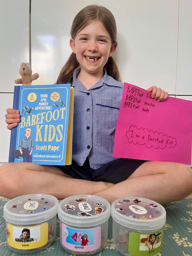 Charlie’s daughter with her Barefoot Kids book.