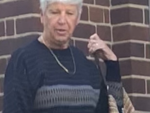 Anne Nicholls (right), 65, of Fairlight, outside Manly Local Court on Wednesday, with her husband, where she pleaded not guilty to one count of assault occasioning actual bodily harm to an alleged offence that dates back to April 2006. Picture: Manly Daily