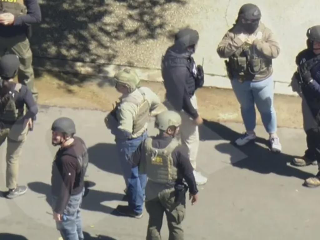 Homeland Security Investigators at Diddy’s LA home. Picture: FOX 11