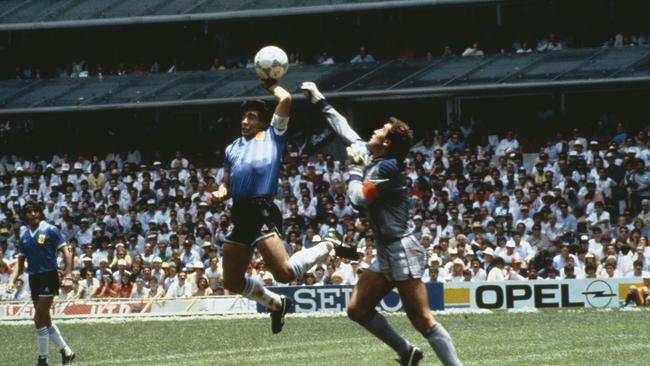 Maradona scores past England goalkeeper Peter Shilton with the Hand of God. Picture: Bob Thomas/Getty