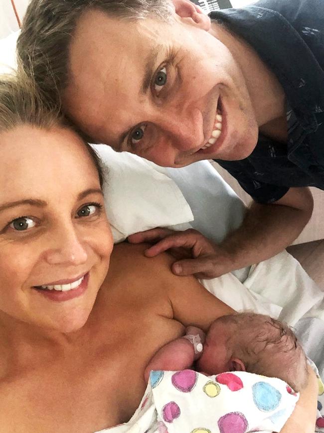 Bickmore with her newborn daughter Adelaide and partner Chris Walker. (Picture: Instagram/bickmorecarrie)