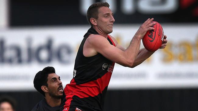 West Adelaide’s Chris Schmidt takes a great grab late in his team’s win over Glenelg.  Picture: Dean Martin