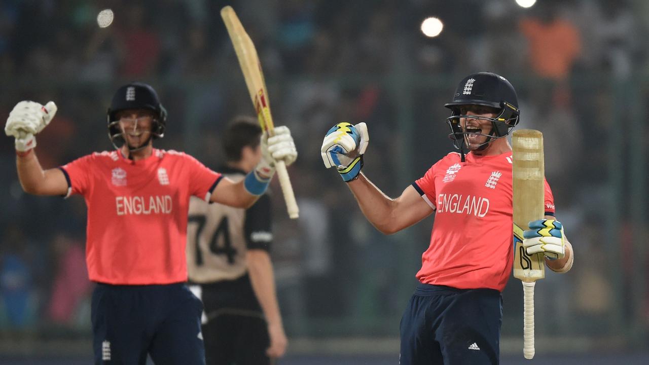 Joe Root (L) and Jos Buttler celebrate beating the Kiwis at the World T20. Picture: AFP