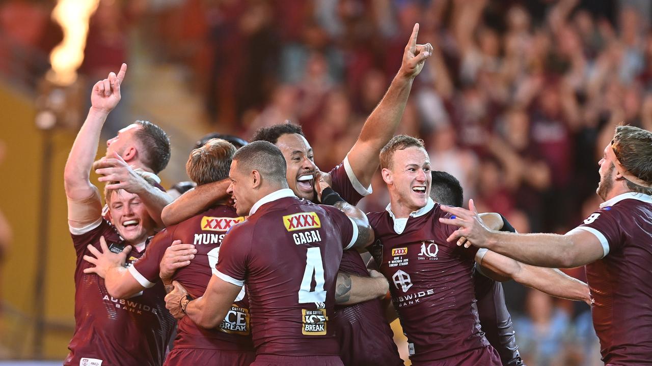 BRISBANE, AUSTRALIA - NOVEMBER 18: The Maroons celebrate after defeating the Blues during game three of the State of Origin series between the Queensland Maroons and the New South Wales Blues at Suncorp Stadium on November 18, 2020 in Brisbane, Australia. (Photo by Bradley Kanaris/Getty Images)