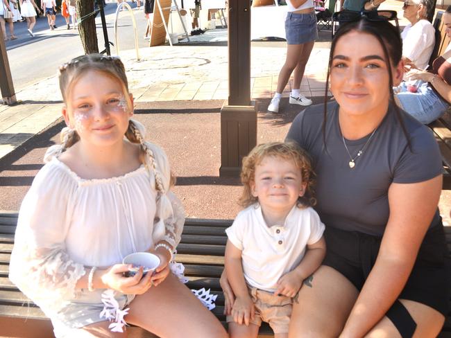 (From left) Kaylee, Bentley and Klerrissa enjoying Stanthorpe's Apple and Grape Harvest Festival on Saturday, March 2, 2024. Photo: Jessica Klein