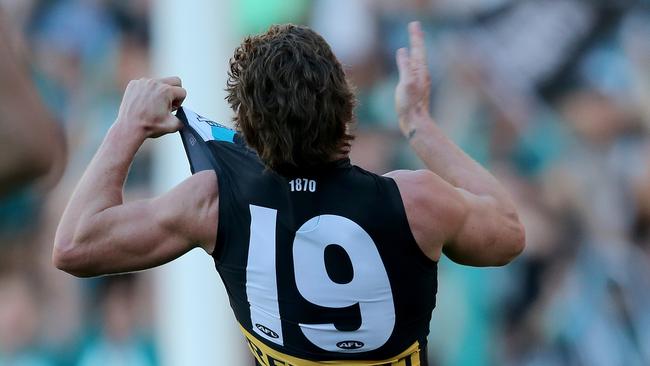 Port Adelaide’s Matt White celebrates a goal with the Power logo. Picture: Simon Cross.