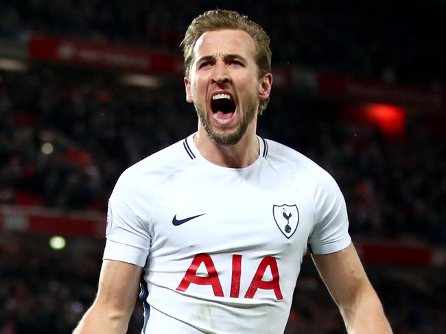 LIVERPOOL, ENGLAND - FEBRUARY 04:  Harry Kane of Tottenham Hotspur celebrates after scoring his sides second goal and his 100th Premier League goal during the Premier League match between Liverpool and Tottenham Hotspur at Anfield on February 4, 2018 in Liverpool, England.  (Photo by Clive Brunskill/Getty Images)