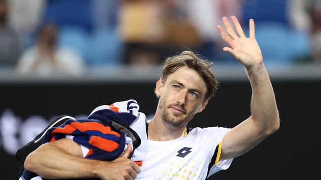 John Millman of Australia celebrates after winning his first round singles match at the 2022 Australian Open. (Photo by Mark Metcalfe/Getty Images)