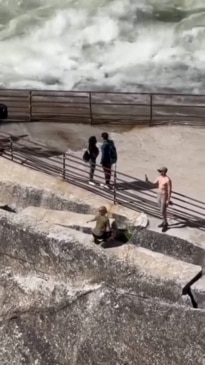 Tourists’ cliff-edge act shocks onlookers