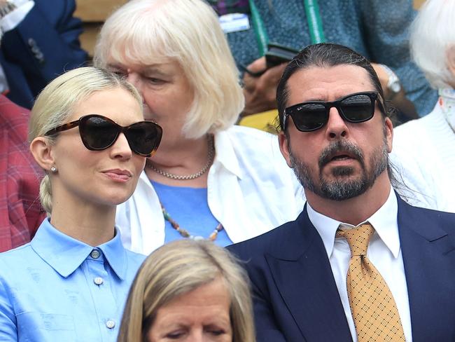 LONDON, ENGLAND - JULY 02: Musician, Dave Grohl, and his wife Jordyn Grohl are seen in the Royal Box ahead of the Ladies' Singles first round match between Jessica Bouzas Maneiro of Spain and VONduring day two of The Championships Wimbledon 2024 at All England Lawn Tennis and Croquet Club on July 02, 2024 in London, England. (Photo by Sean M. Haffey/Getty Images)