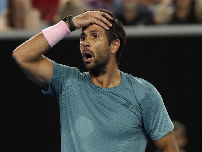 Spain's Fernando Verdasco reacts while competing against Croatia's Marin Cilic in their third round match at the Australian Open tennis championships in Melbourne, Australia, early Saturday, Jan. 19, 2019. (AP Photo/Mark Schiefelbein)