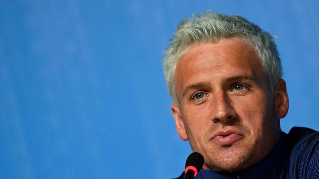 US gold medallist Ryan Lochte has had questions raised about his claims to have had a gun held to his head in Rio. Picture: Martin Bureau