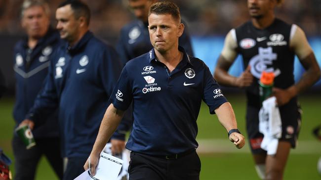 Carlton coach Brendon Bolton after speaking to his players.