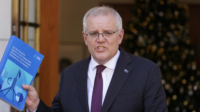 Scott Morrison with the Jenkins review report on Tuesday. Picture: Adam Taylor