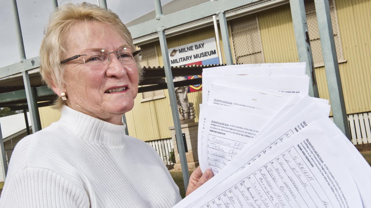 SUPPORTERS SIGN: Milne Bay Military Museum president Marian Jones with many signatures to save the museum in 2018.