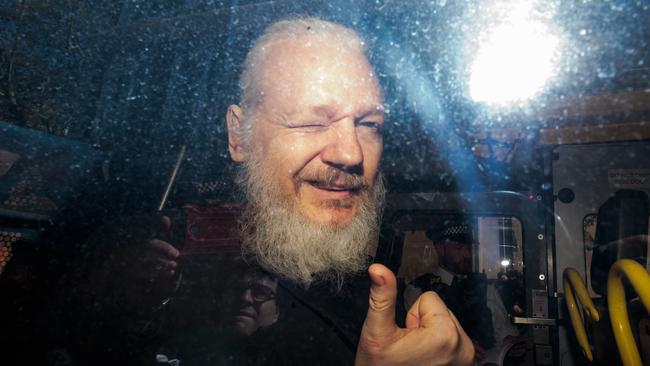 Julian Assange following his 2019 arrest after Ecuador withdrew the Australian’s asylum. The WikiLeaks founder is now fighting extradition to the US. Picture. Getty Images.