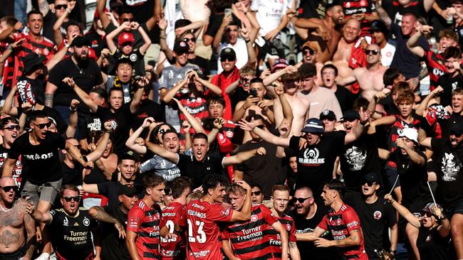 GOSFORD, AUSTRALIA – FEBRUARY 22: Jack Clisby of the Wanderers celebrates scoring a goal with teammates during the round 20 A-League Men match between Central Coast Mariners and Western Sydney Wanderers at Industree Group Stadium, on February 22, 2025, in Gosford, Australia. (Photo by Brendon Thorne/Getty Images)