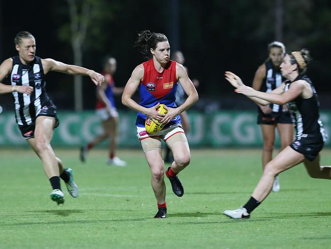 Collingwood players close in on Demon Elise O'Dea. Picture: Ian Currie