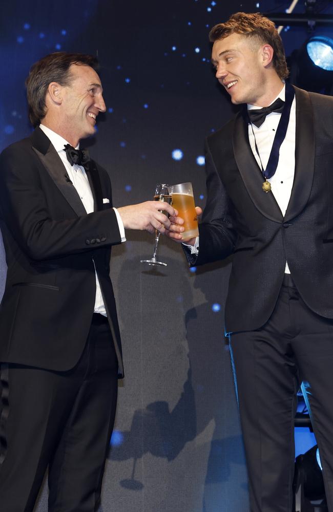 Dillon shares a toast with Brownlow medallist Patrick Cripps. Picture: Michael Klein