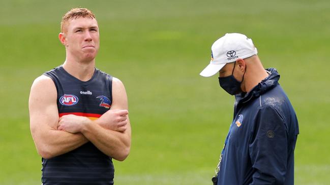 Lynch talks with coach Matthew Nicks at Crows training last week. Picture: Daniel Kalisz/Getty Images