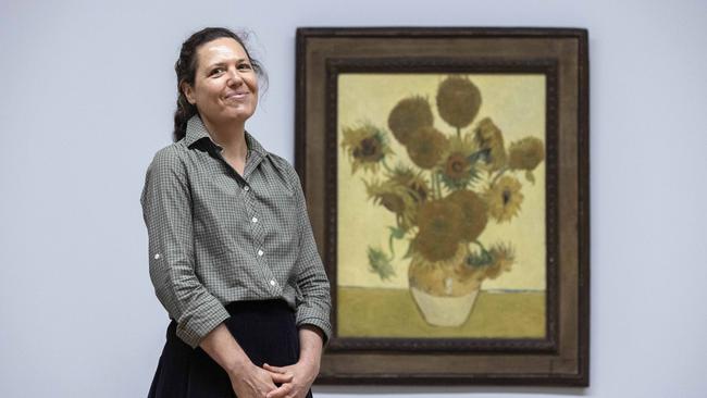 National Gallery of Australia co-ordinating curator Sally Foster with Vincent Van Gogh’s Sunflowers 1888. Picture: NCA NewsWire/Gary Ramage