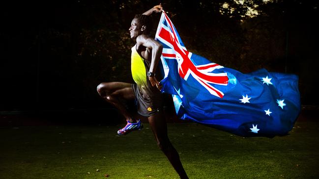 Peter Bol flying the flag for Australia. Picture: Ian Munro