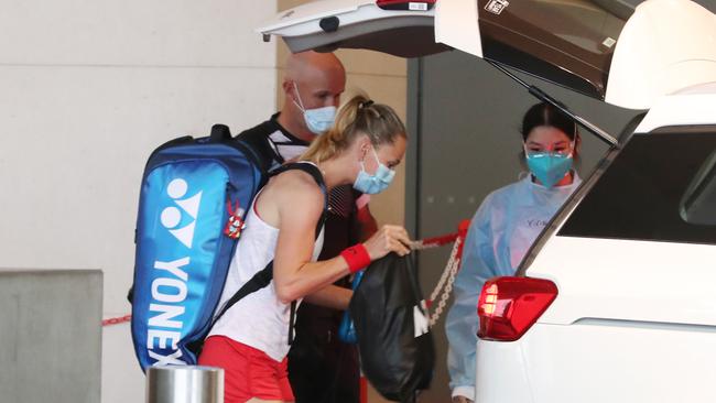 Players and training staff depart quarantine at Melbourne’s Grand Hyatt hotel depart for training sessions. Picture: NCA NewsWire/ David Crosling