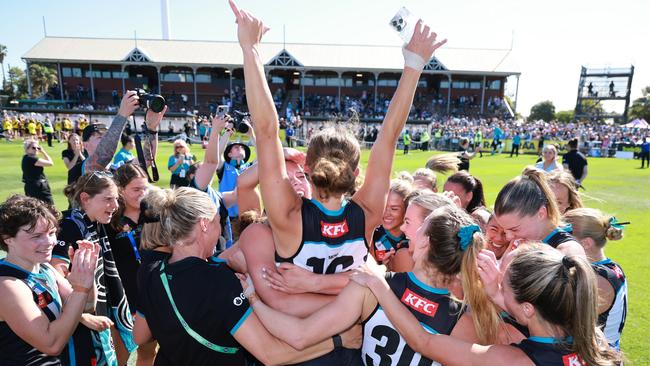 ADELAIDE, AUSTRALIA - NOVEMBER 10: The Power celebrate their win during the 2024 AFLW Second Elimination Final match between the Port Adelaide Power and the Richmond Tigers at Alberton Oval on November 10, 2024 in Adelaide, Australia. (Photo by James Elsby/AFL Photos via Getty Images)