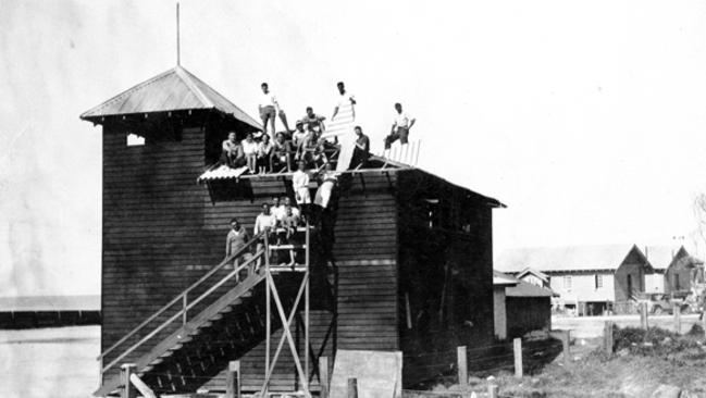 Surfers Paradise Surf Life Saving Club’s original clubhouse under construction on the beach, 1920s.