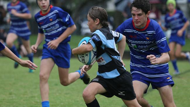 Day 1 of the King of the Country junior rugby union tournament at the Gold Coast Eagles Rugby Union Club.Maroochydore Swans (BLUE AND BLACK) vs USQ Saints (Blue ) Maroochydore Player No USQ Player No Pic Mike Batterham