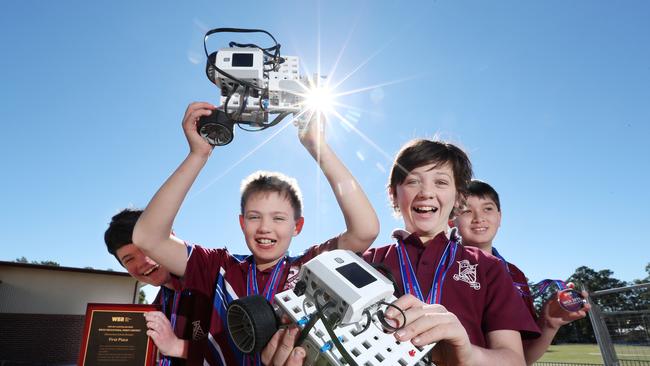 Ashgrove State School Year 6 students Sebastian Cumplido-Richards, Luke Jacobsen, David Plater, and Ethan White, winners of the Australian open World Educational Robot competition. Ashgrove SS scored a perfect 100 in the Better Education list, once again. Picture: Liam Kidston