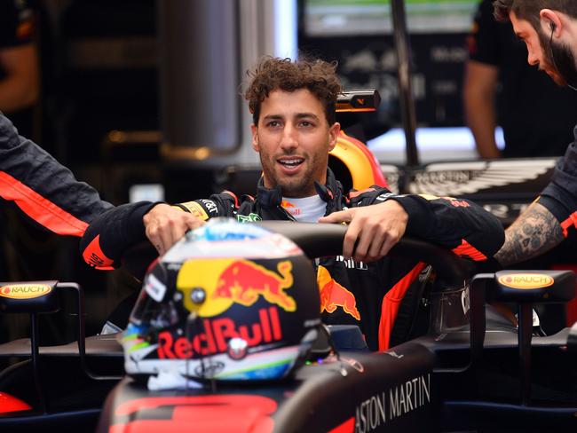 Fans can cheer on Daniel Ricciardo at Albert Park and then their favourite footy team a week later. Picture: AFP/Saeed Khan