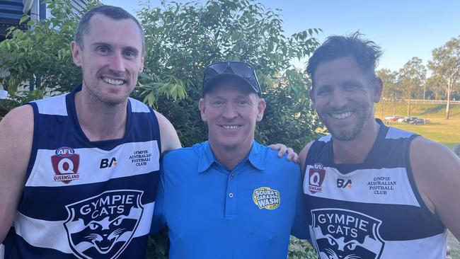 Former Brisbane Lions player Matthew Leuenberger (left) with sponsor Steve Wetton from Scuba's Car and Dog Wash, and Ben Collins.